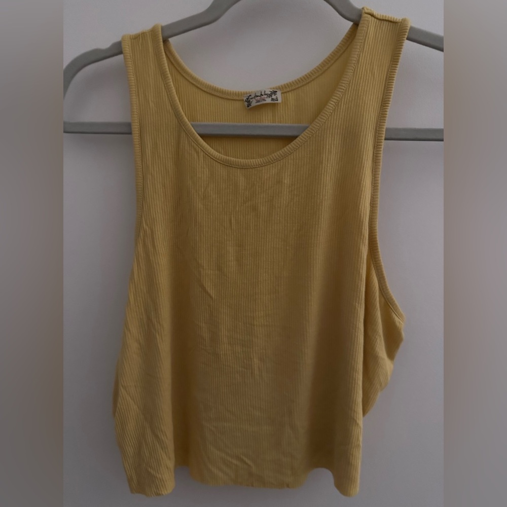 2 FREE PEOPLE SIZE LARGE CROP TOPS. NWOT MUSTARD AND WHITE THIN TANKS